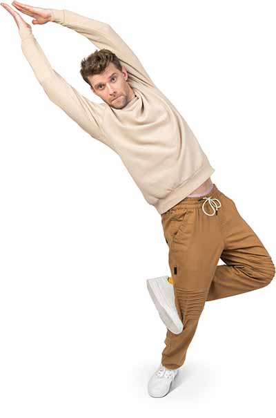 a young man jumping in the air while doing a trick